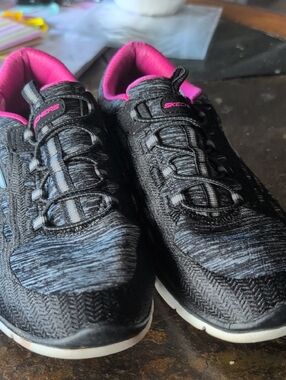 Skechers Women's Black Athletic Slip-On Sneakers with Pink Lining